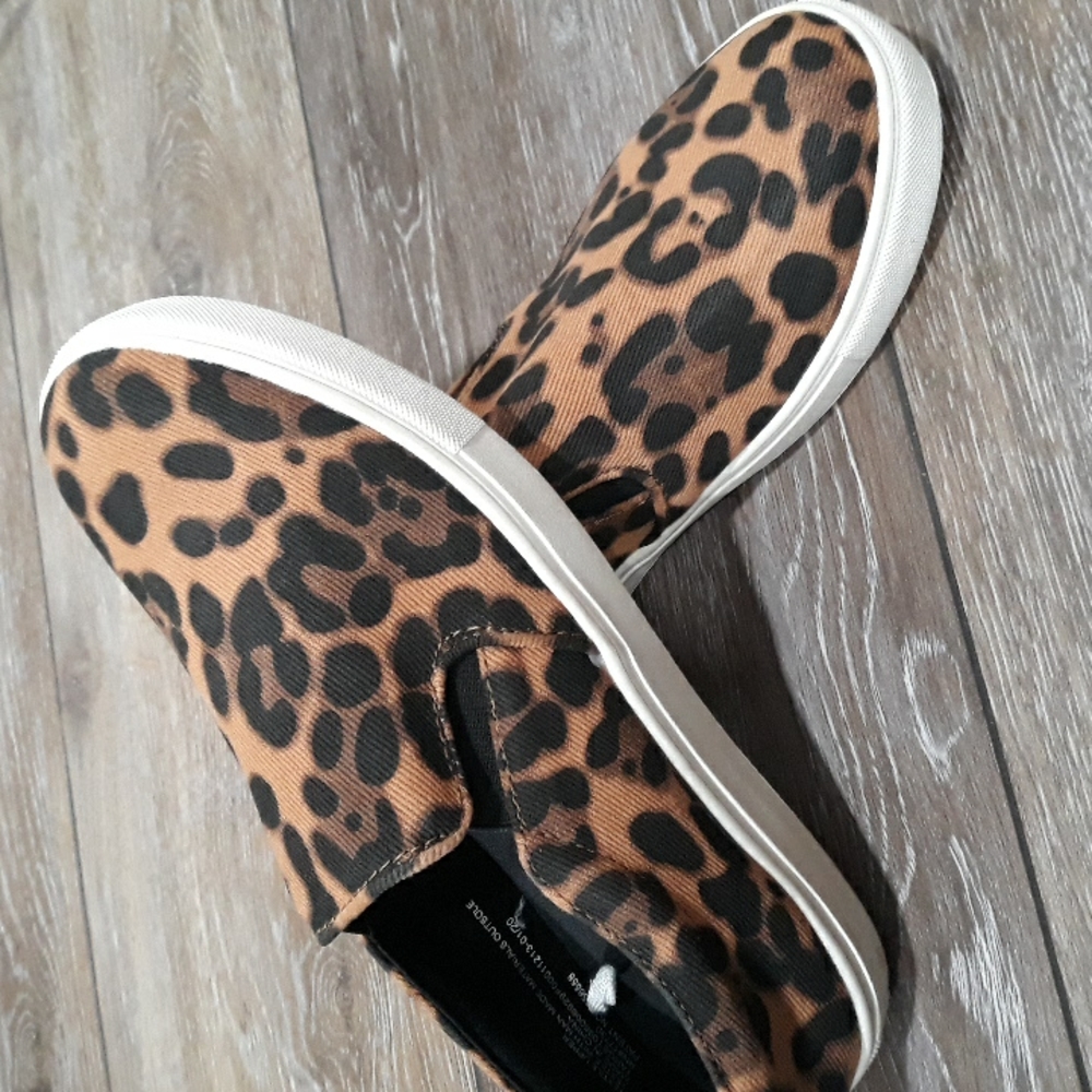 A New Day womens brown and orange animal print fabric slip ons. Size 7